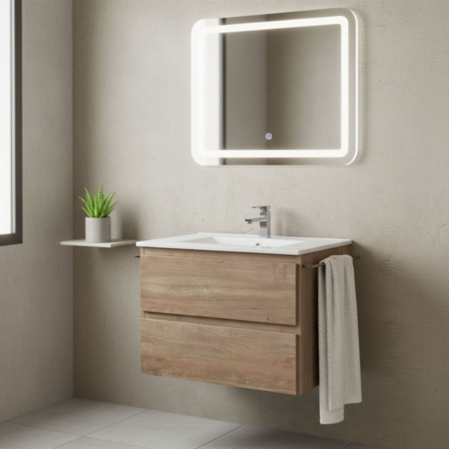 Ambiente de casa de banho com o móvel Soria 80cm roble claro, espelho LED e toalheiro.