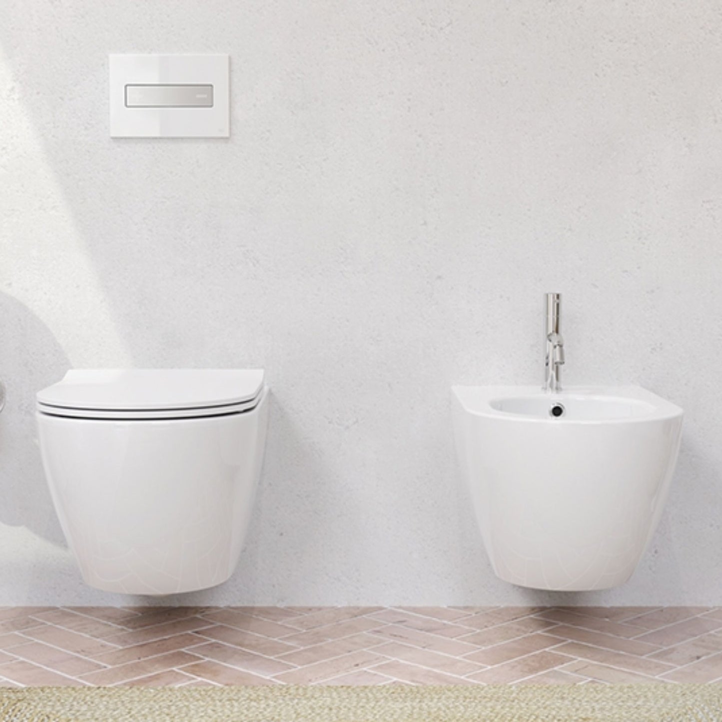 Ambiente de casa de banho decorada com bidé e sanita suspensos da linha Lake da Oli.