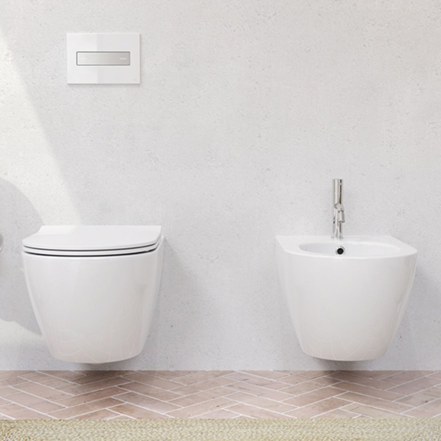 Ambiente de casa de banho decorada com bidé e sanita suspensos da linha Lake da Oli.