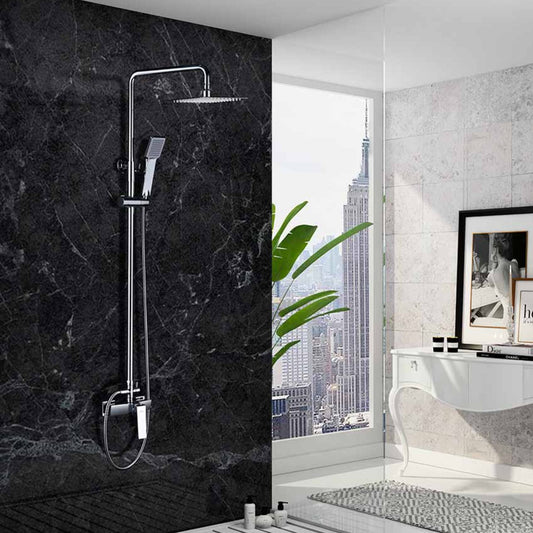 Coluna de duche Imex Art cromada instalada em parede de mármore preto numa casa de banho de design moderno.