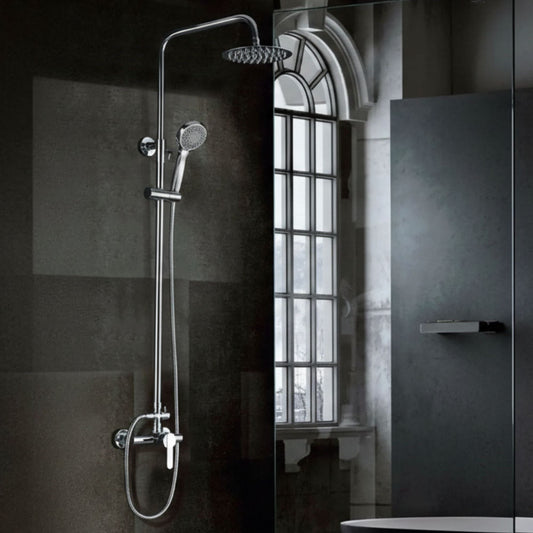 Coluna de duche Roma Imex cromada instalada em ambiente de casa de banho moderna.