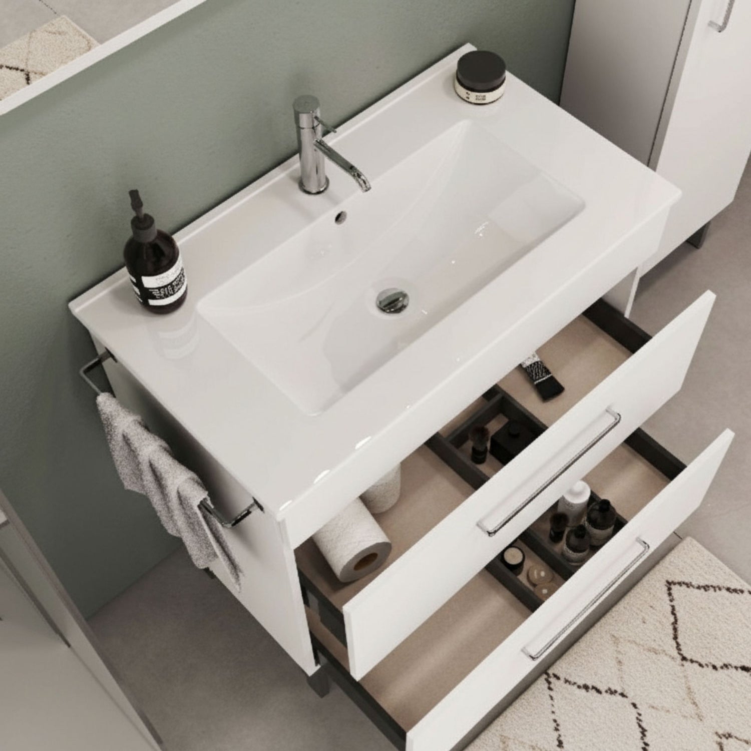 Lavatório Fifty 81 cm branco instalado sobre móvel de casa de banho com gavetas abertas.