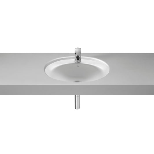 Lavatório de encastrar oval Roca Fidji em porcelana branca instalado em bancada cinza.