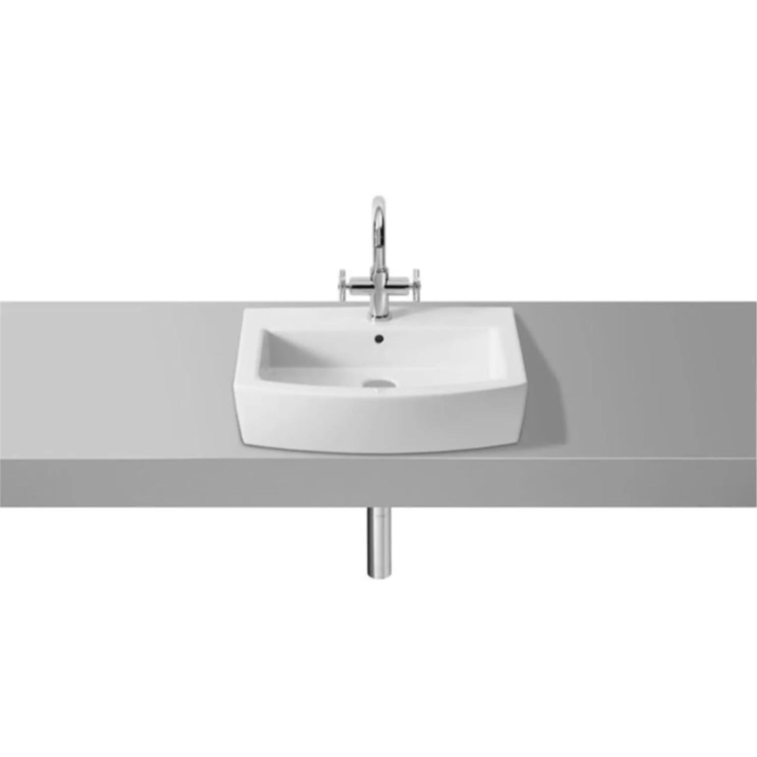 Lavatório de bancada Roca Hall 55 em porcelana branca instalado sobre bancada cinza.