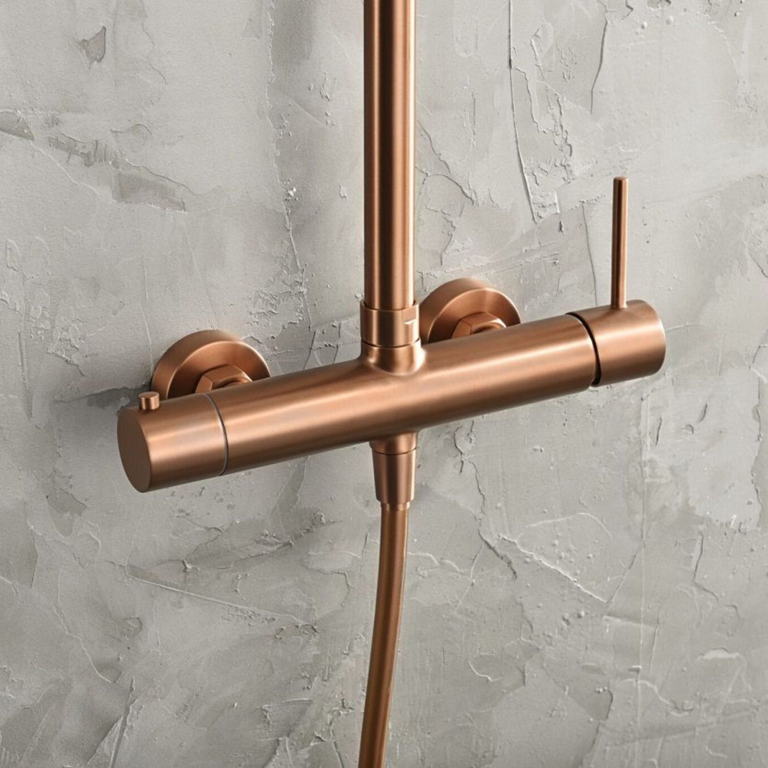 Comando monocomando de design cilíndrico para coluna de duche Monza ouro rosa mate.
