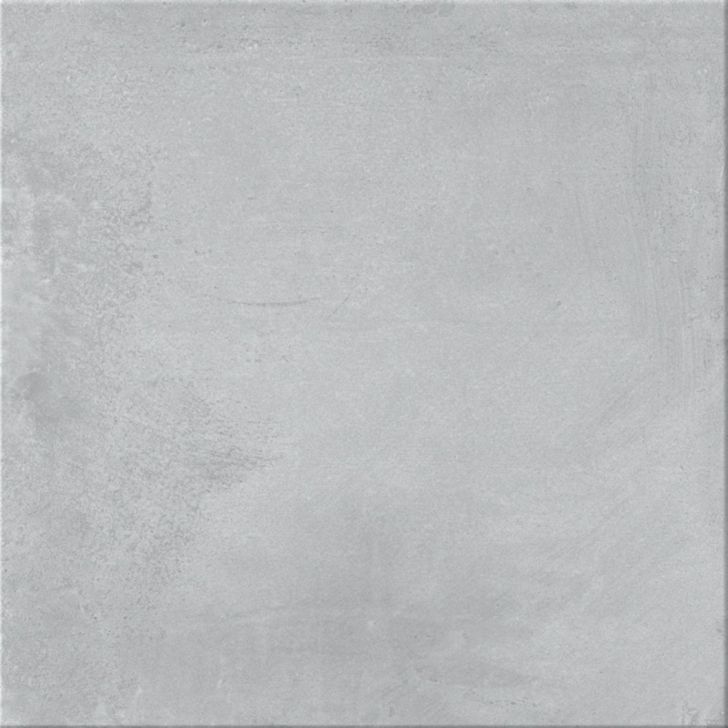 Pavimento cerâmico Dominó Newstreet Fog Eco 60x60cm visto em pormenor, mostrando a textura de efeito cimento cinza claro.