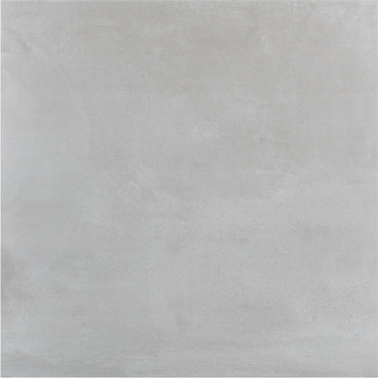Alt text= 'Peça única do pavimento cerâmico Bristol Perla da Ecoceramic, exibindo a sua textura e tom cinza claro.'