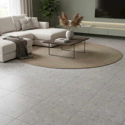 Sala de estar moderna decorada com pavimento cerâmico Dominó Evostone Gran Grey 60x60cm.