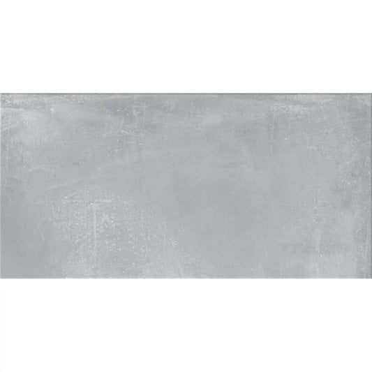 alt='Peça individual de pavimento de efeito cimento na cor cinza Fog da coleção Newstreet.'
