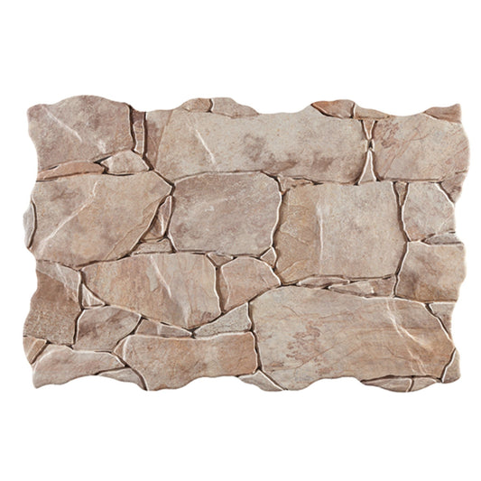 Detalhe da peça individual do revestimento Britania Arena 34x50 mostrando o relevo e textura de pedra.